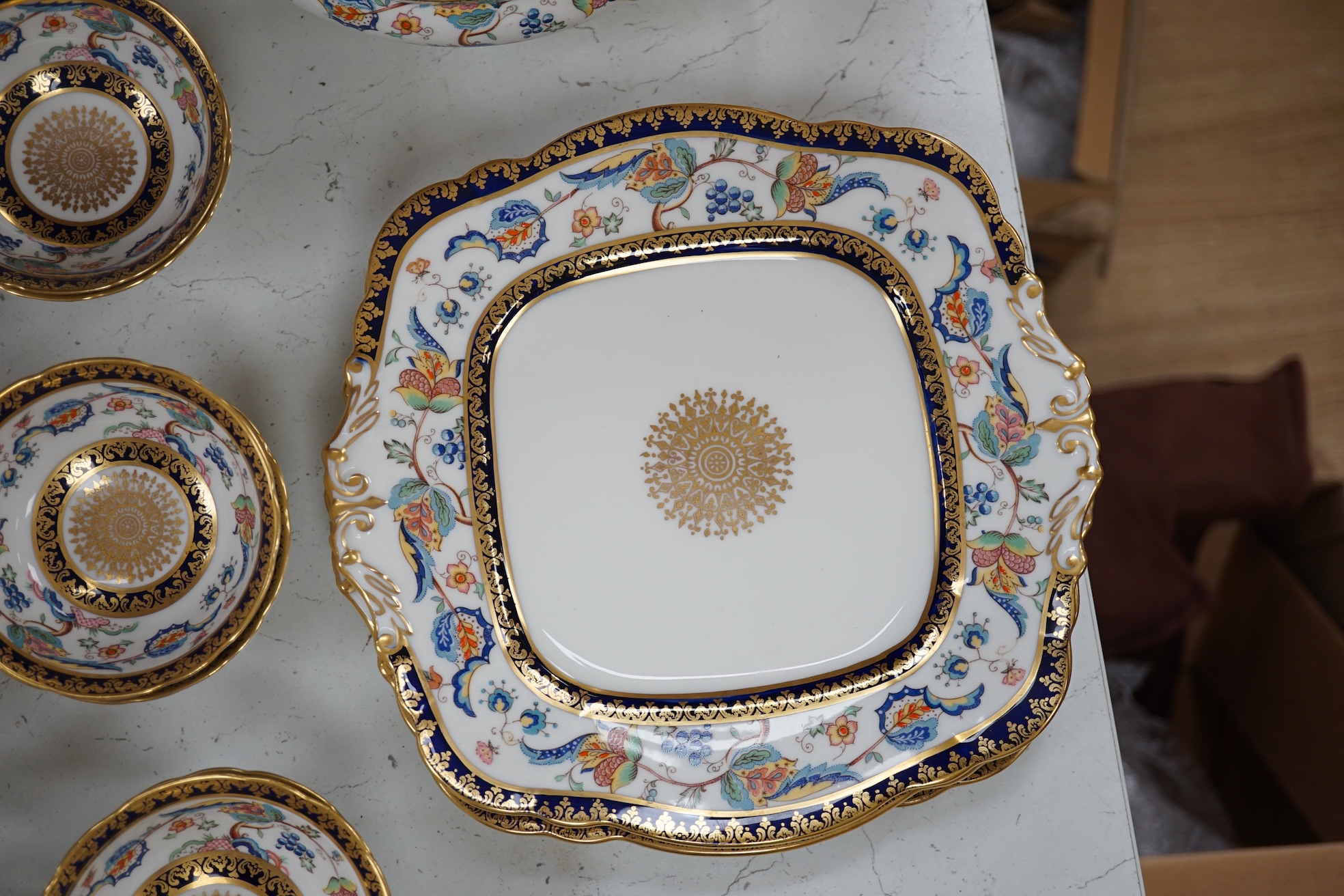 An extensive Paragon bone china dinner service to include tureens, plates and sauce boats. Condition - fair to good